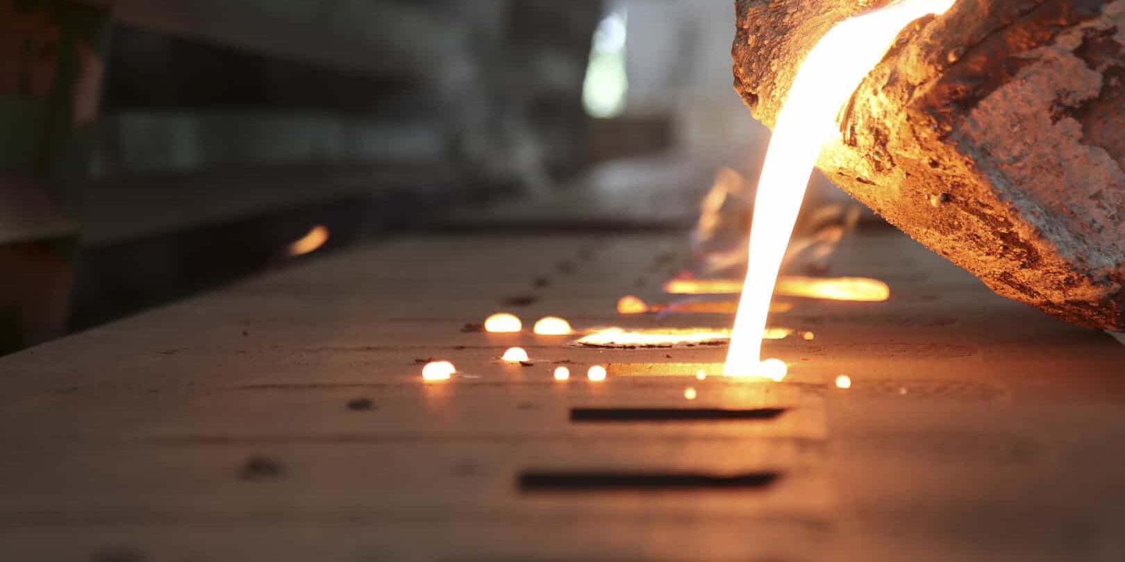 Pouring molten metal